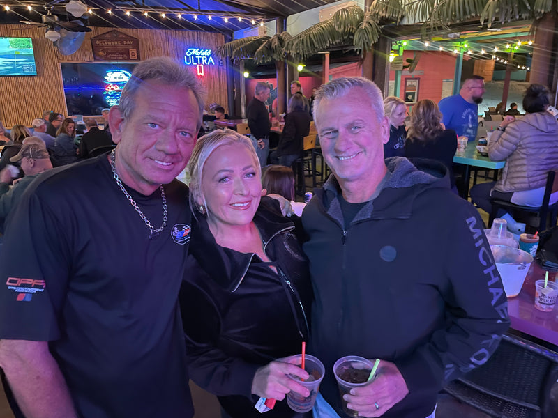 Offshore racing enthusiast celebrating at a performance boating event