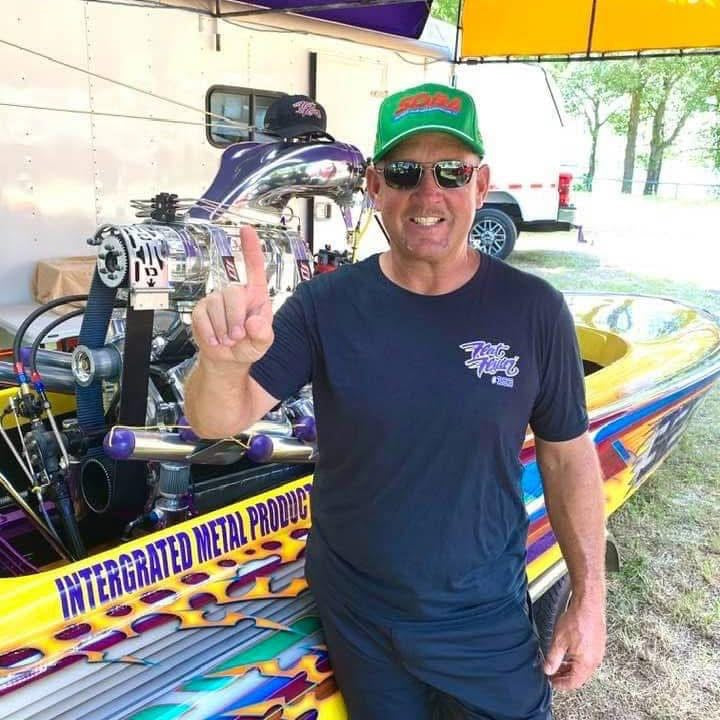 Frank Carter’s top fuel Hydro jet boat champion racer next to his high-performance race boat